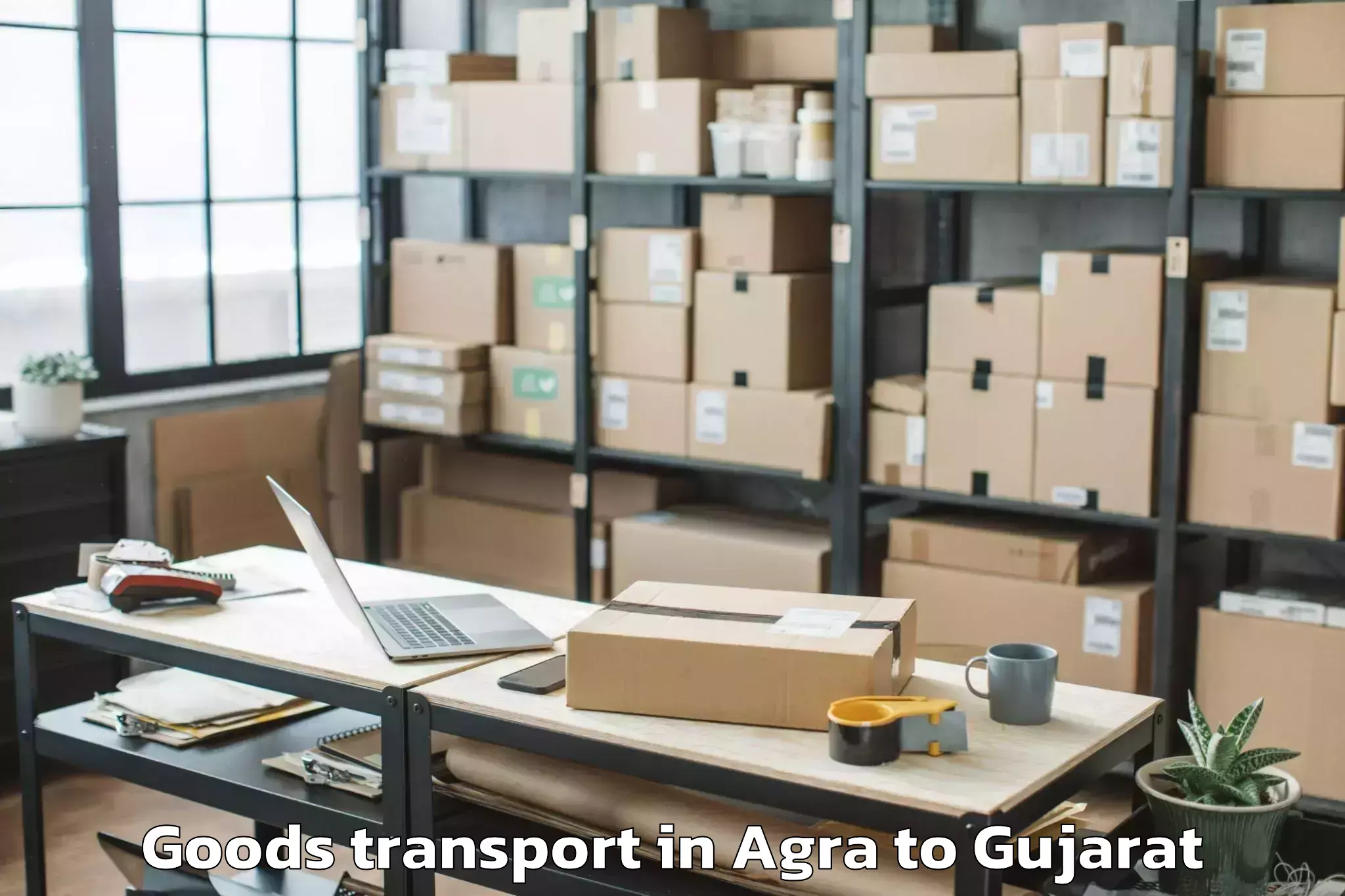 Book Your Agra to Hansot Goods Transport Today